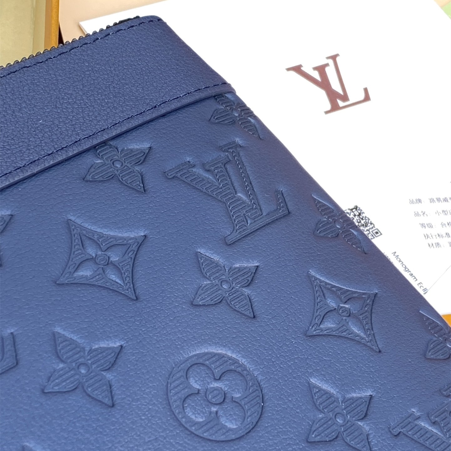 高仿LV*PochetteTogo系列M81579牛皮印花手拿包黑色免檢版